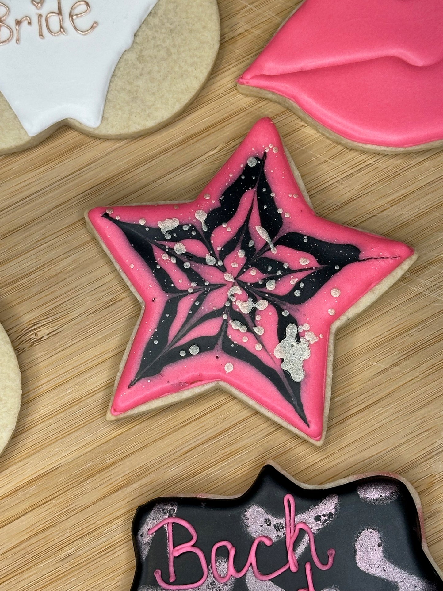 custom bachelorette sugar cookies, pink, black and rose gold star sugar cookie