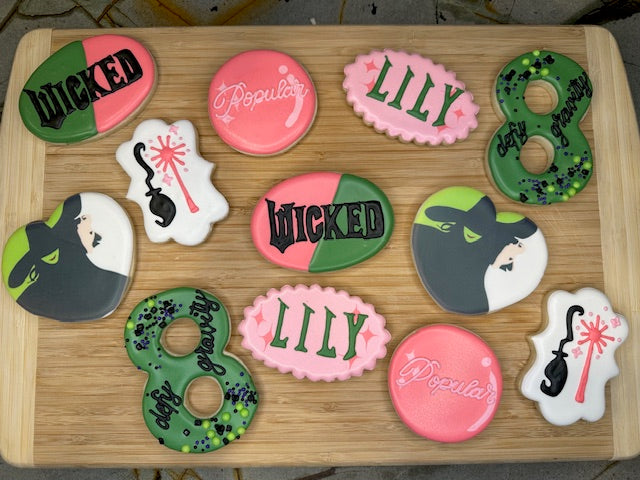 custom birthday sugar cookies in wicked the musical theme