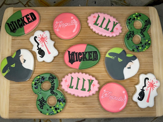 custom birthday sugar cookies in wicked the musical theme
