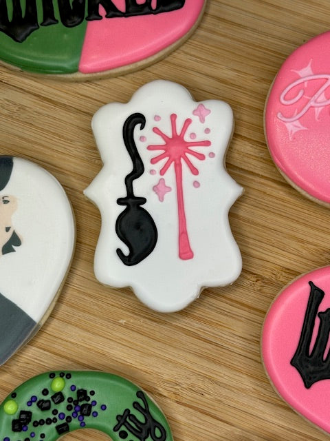 custom birthday sugar cookies in wicked the musical theme