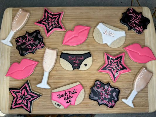 custom bachelorette sugar cookies in black, pink, and rose gold color scheme
